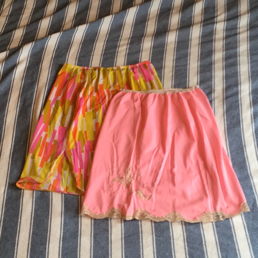 Two adorable vintage skirt slips